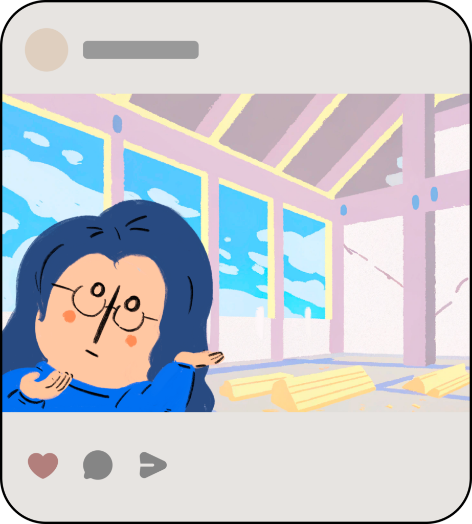 A cartoon-style image shown as a social media post. In the foreground, a person with long dark blue hair and round glasses gestures with both hands toward the background, as if introducing or presenting it. They wear a blue sweater and have a neutral expression. The background features a large structure under construction with wooden beams and tall windows showing a bright blue sky with white clouds. Wooden planks are scattered on the floor. Social media icons for like, comment, and share are visible below the image.